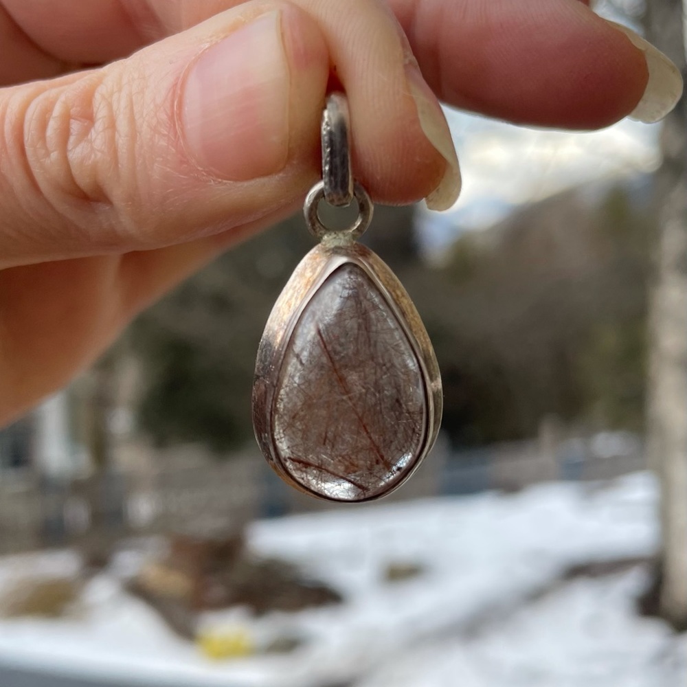 Precious stone and sterling silver pendant